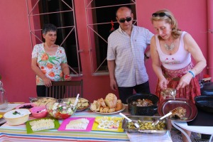 Family members of hostel staff setting out lunch on Easter Sunday.